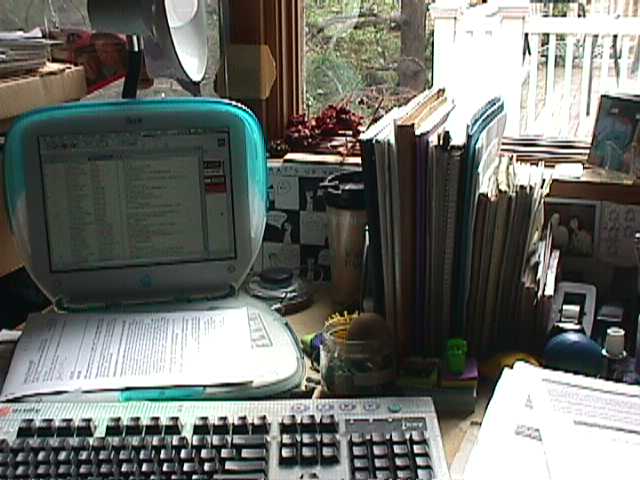 photo of computer, books, paper