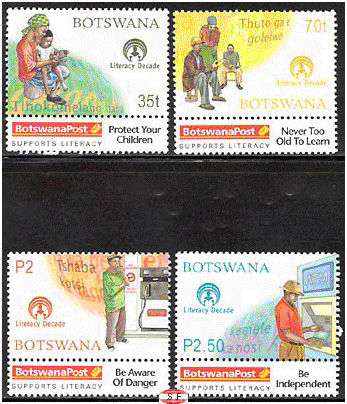 four stamps depicting literacy